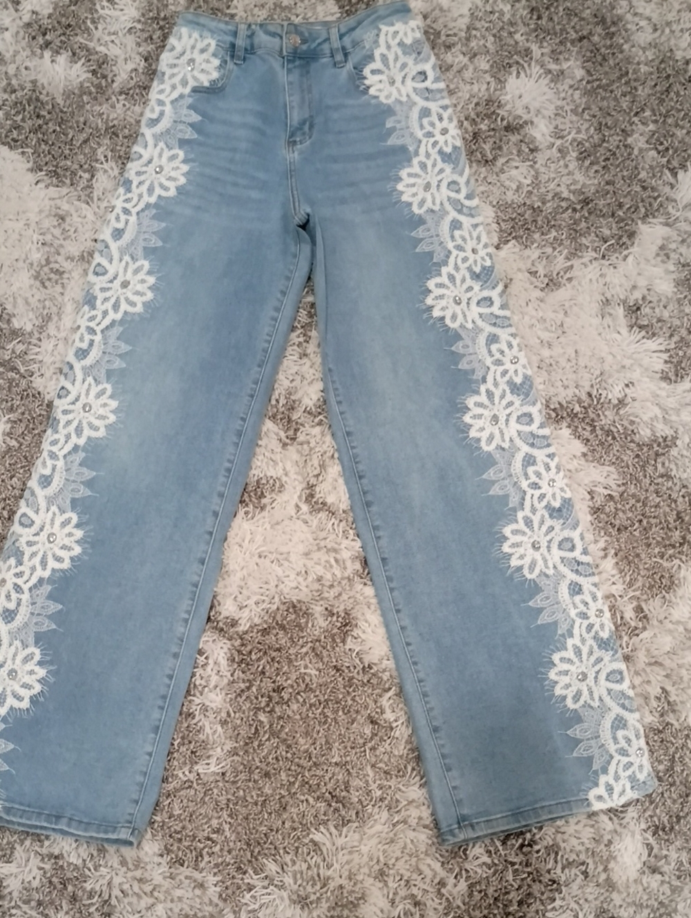 Light Blue Wide-Leg Jeans with White Lace Trim
